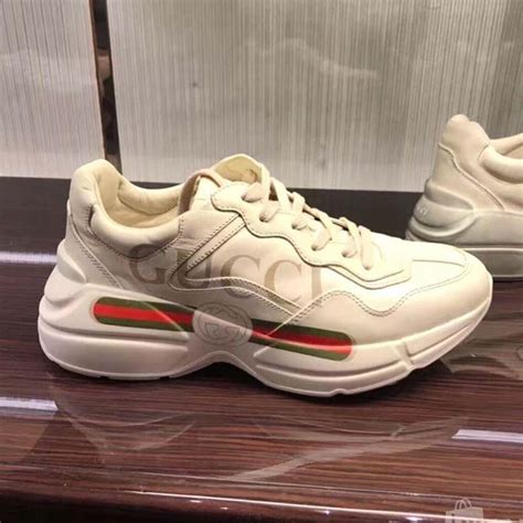 beige gucci sneakers.